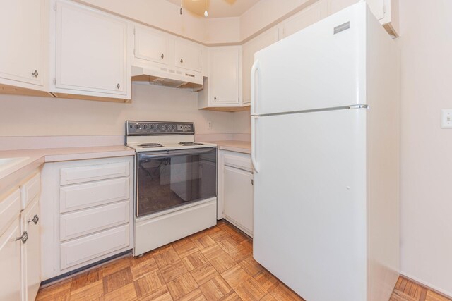 2705 Winthrop Ct, Ann Arbor, MI 48104 - kitchen featuring white appliances, under cabinet range hood, light countertops, and white cabinets