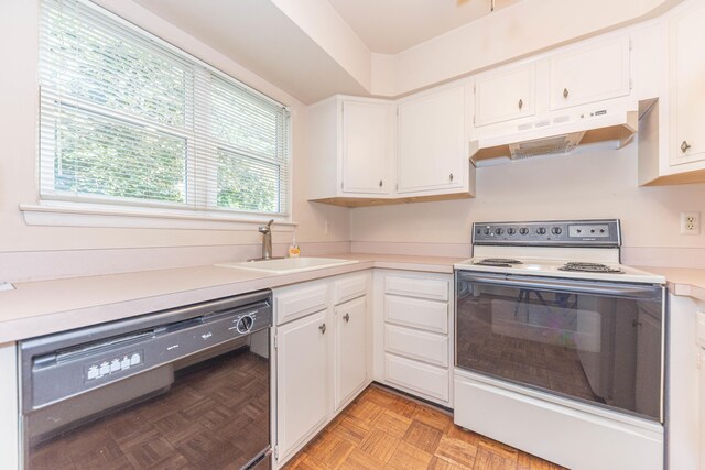 2705 Winthrop Ct, Ann Arbor, MI 48104 - kitchen with white electric range oven, under cabinet range hood, dishwashing machine, a sink, and healthy amount of natural light