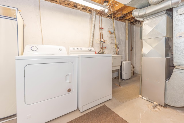 2705 Winthrop Ct, Ann Arbor, MI 48104 - washroom with separate washer and dryer and heating unit