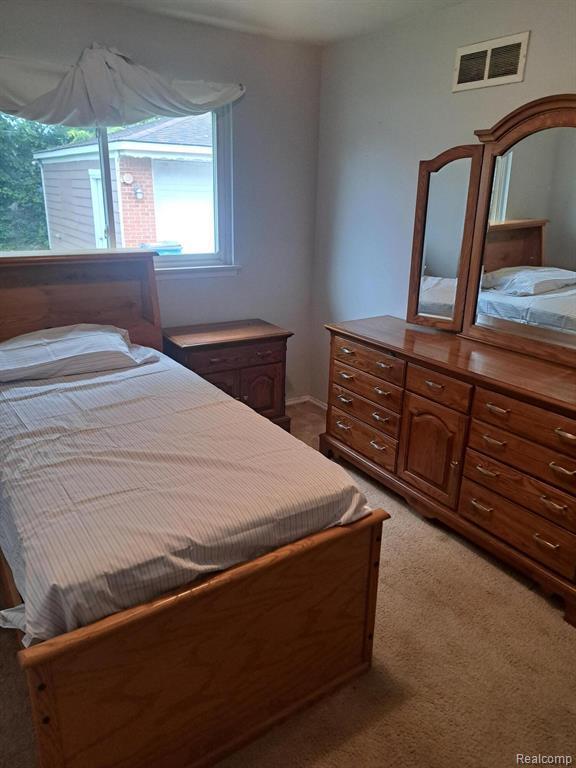 4510 Croissant St, Allen Park, MI 48125 - bedroom featuring light carpet