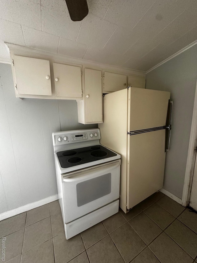 811 Robinwood St, Pontiac, MI 48340 - kitchen featuring white appliances, dark tile patterned flooring, baseboards, ornamental molding, and a ceiling fan