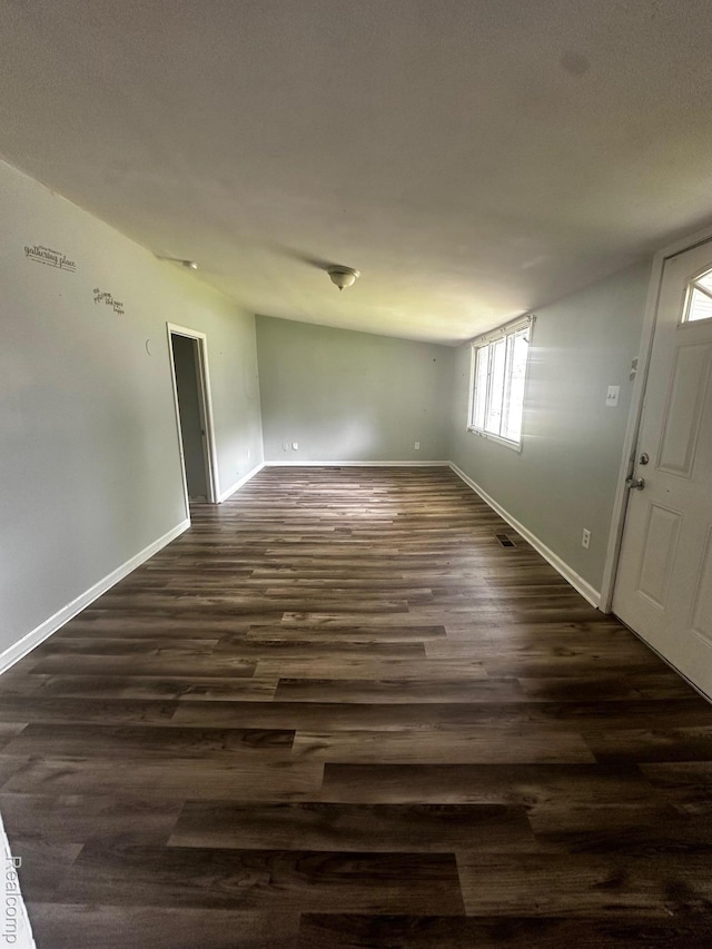 811 Robinwood St, Pontiac, MI 48340 - spare room with dark wood-style flooring and baseboards