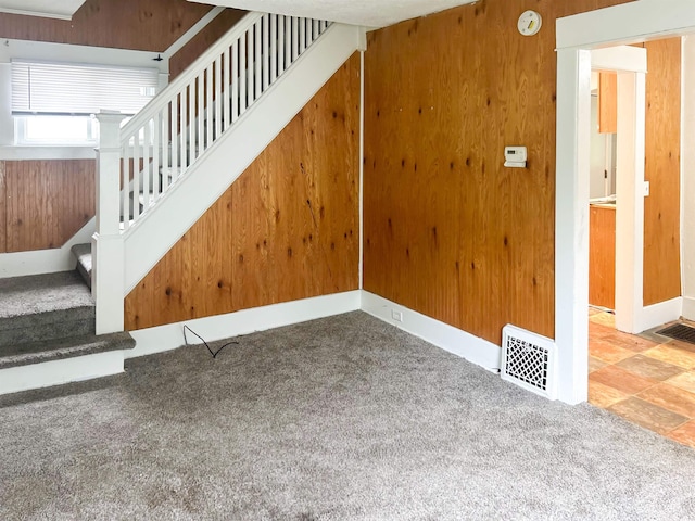 611 E Mount Hope Ave, Lansing, MI 48910 - staircase featuring carpet flooring