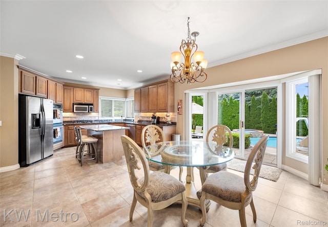 14163 Longneedle Ct, Shelby Twp, MI 48315 - dining area featuring crown molding, a chandelier, light tile patterned flooring, and recessed lighting