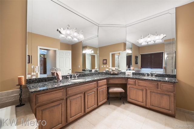 14163 Longneedle Ct, Shelby Twp, MI 48315 - full bathroom with double vanity, tile patterned flooring, and a chandelier