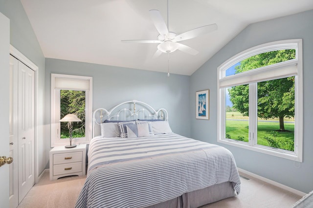 565 Hawksnest Dr, South Haven, MI 49090 - bedroom featuring lofted ceiling, light colored carpet, baseboards, a closet, and ceiling fan