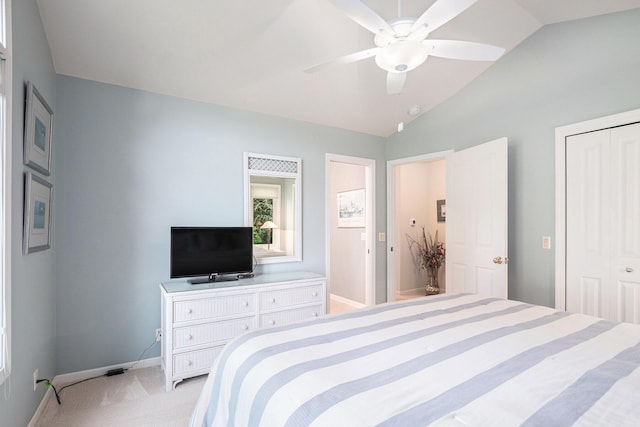 565 Hawksnest Dr, South Haven, MI 49090 - bedroom with vaulted ceiling, baseboards, light colored carpet, and ceiling fan