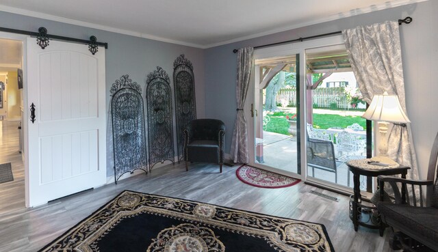 4143 Browning Dr, Saint Joseph, MI 49085 - sitting room featuring wood finished floors and ornamental molding