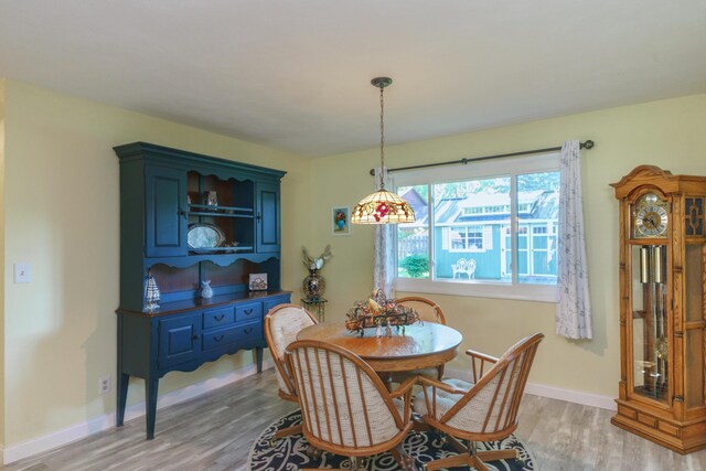 4143 Browning Dr, Saint Joseph, MI 49085 - dining space with light wood-type flooring and baseboards