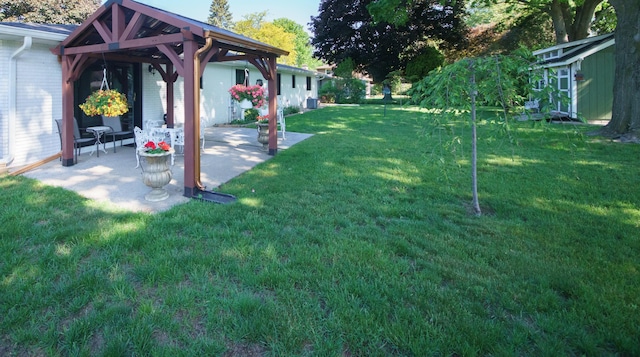 4143 Browning Dr, Saint Joseph, MI 49085 - view of green lawn with a patio and a gazebo