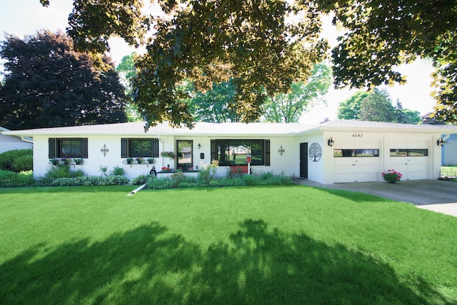 4143 Browning Dr, Saint Joseph, MI 49085 - ranch-style home with an attached garage, a front yard, and driveway