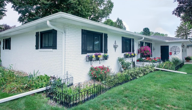 4143 Browning Dr, Saint Joseph, MI 49085 - ranch-style house featuring a front lawn and brick siding