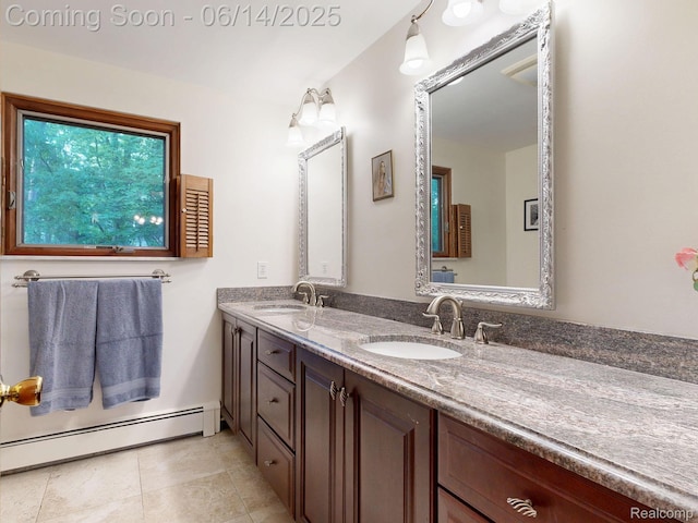 6624 Wellesley Ter, Clarkston, MI 48346 - bathroom featuring double vanity, a baseboard radiator, and tile patterned flooring