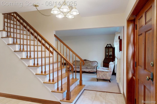 6624 Wellesley Ter, Clarkston, MI 48346 - entryway featuring stairs, a chandelier, and light colored carpet