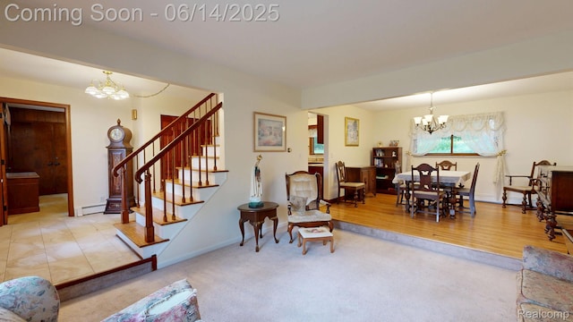 6624 Wellesley Ter, Clarkston, MI 48346 - living area with a chandelier, stairs, a baseboard radiator, and carpet flooring