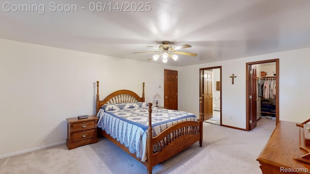 6624 Wellesley Ter, Clarkston, MI 48346 - bedroom with light carpet, a closet, a walk in closet, ensuite bath, and ceiling fan