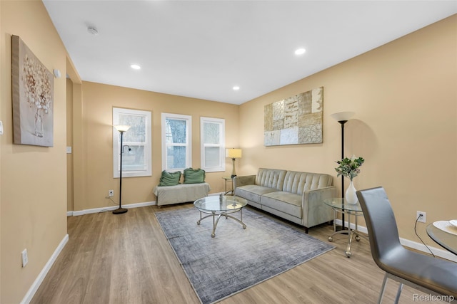 8857 Charlevoix St, Detroit, MI 48214 - living area featuring baseboards, wood finished floors, and recessed lighting