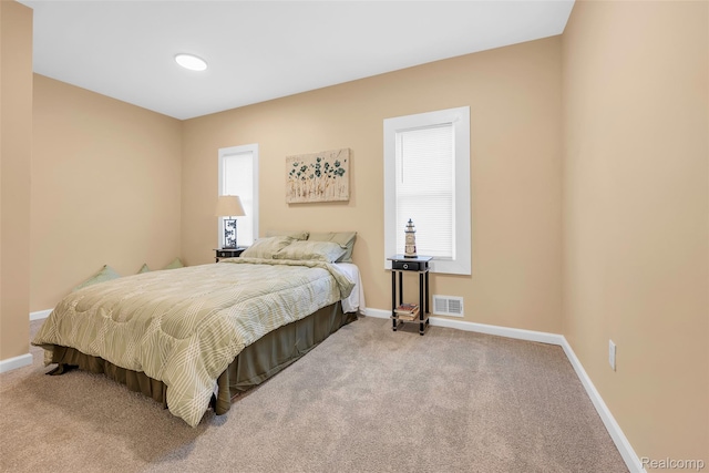 8857 Charlevoix St, Detroit, MI 48214 - carpeted bedroom with baseboards