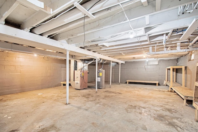 15765 Mason St, Union, MI 49130 - unfinished below grade area featuring water heater and heating unit