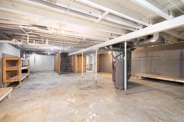 15765 Mason St, Union, MI 49130 - unfinished basement with stairway and water heater