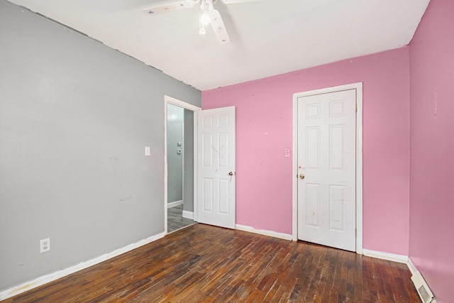 15765 Mason St, Union, MI 49130 - unfurnished bedroom with wood-type flooring, baseboards, and ceiling fan