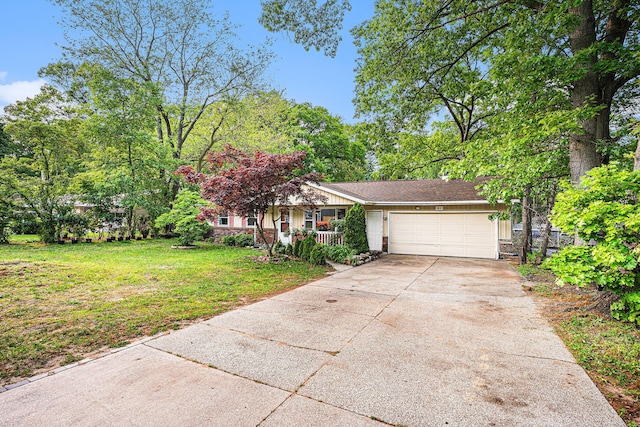 81 Dunton Ave, Holland, MI 49424 - view of front facade with an attached garage, a front lawn, and concrete driveway