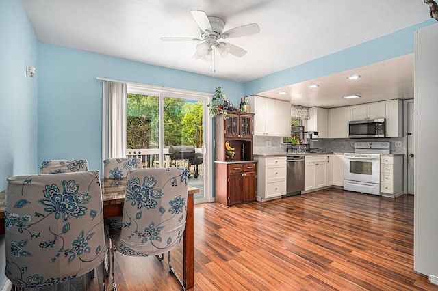 81 Dunton Ave, Holland, MI 49424 - dining area featuring wood finished floors, ceiling fan, and recessed lighting