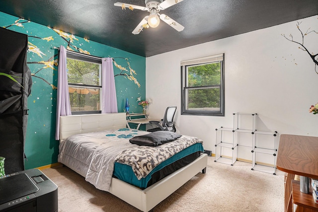 81 Dunton Ave, Holland, MI 49424 - bedroom with carpet floors, baseboards, and ceiling fan