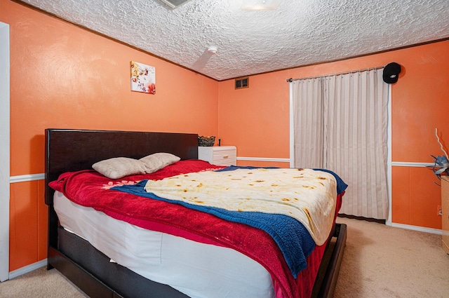 81 Dunton Ave, Holland, MI 49424 - bedroom with a textured ceiling, carpet, and baseboards