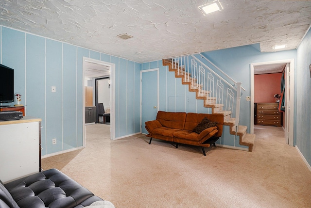 81 Dunton Ave, Holland, MI 49424 - carpeted living area featuring stairway