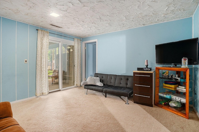81 Dunton Ave, Holland, MI 49424 - carpeted living room with a textured ceiling