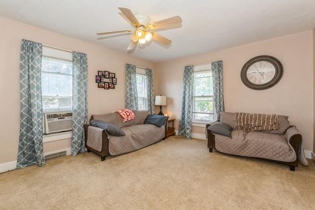 927 Harrison Ave, Saint Joseph, MI 49085 - carpeted living area featuring baseboards, a ceiling fan, and cooling unit
