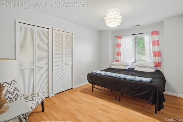 1332 Shoemaker Dr Unit 1332, Belleville, MI 48185 - bedroom with light wood-style flooring and baseboards