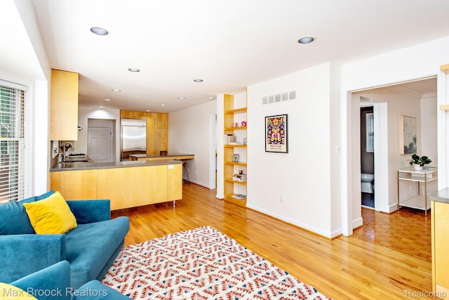 8019 Concord Rd, Huntington Woods, MI 48070 - living area featuring light wood-type flooring and recessed lighting