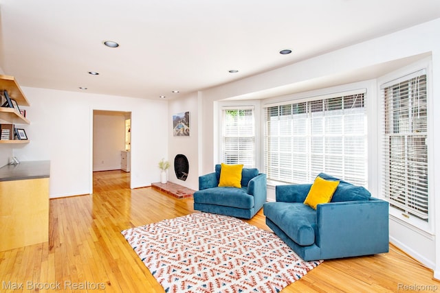 8019 Concord Rd, Huntington Woods, MI 48070 - living room with wood finished floors and recessed lighting