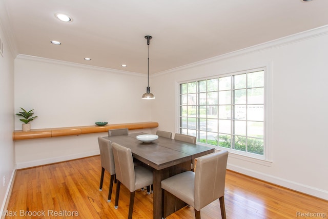 8019 Concord Rd, Huntington Woods, MI 48070 - dining area featuring ornamental molding, light wood-style floors, and recessed lighting