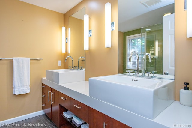 8019 Concord Rd, Huntington Woods, MI 48070 - bathroom with double vanity and tile patterned floors