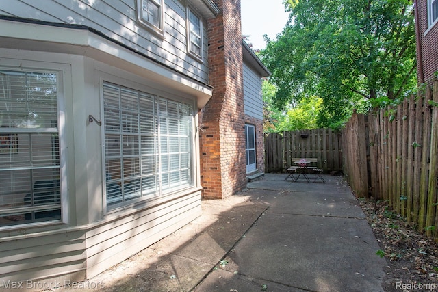 8019 Concord Rd, Huntington Woods, MI 48070 - fenced backyard with a patio