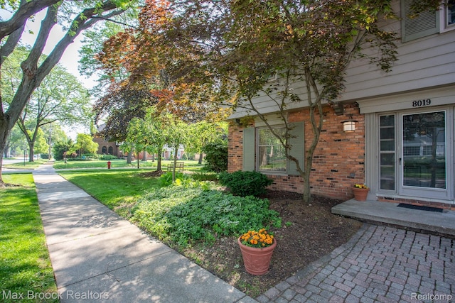 8019 Concord Rd, Huntington Woods, MI 48070 - view of exterior entry with brick siding
