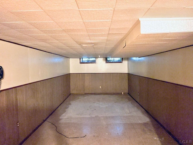 315 S Hanlon St, Westland, MI 48186 - below grade area with a wainscoted wall, wooden walls, and a drop ceiling