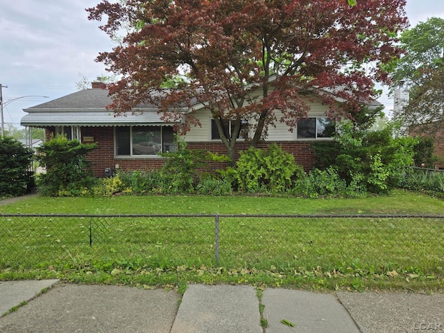 315 S Hanlon St, Westland, MI 48186 - view of front of house with brick siding and a chimney