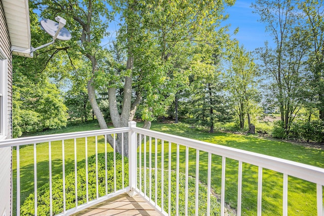 5700 Dexter Townhall Rd, Dexter, MI 48130 - wooden deck featuring view of scattered trees and a lawn
