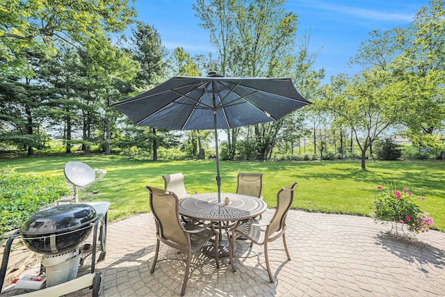 5700 Dexter Townhall Rd, Dexter, MI 48130 - view of patio / terrace with outdoor dining space and view of scattered trees