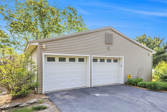 5700 Dexter Townhall Rd, Dexter, MI 48130 - garage featuring driveway