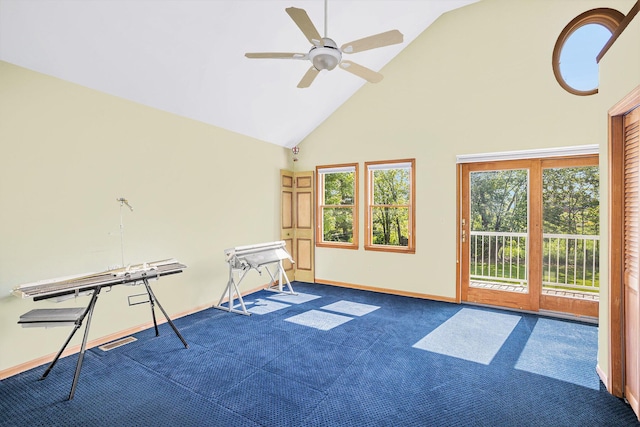 5700 Dexter Townhall Rd, Dexter, MI 48130 - carpeted empty room with high vaulted ceiling, baseboards, and ceiling fan