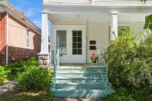 817 Harrison Ave, Saint Joseph, MI 49085 - view of exterior entry with a porch and french doors