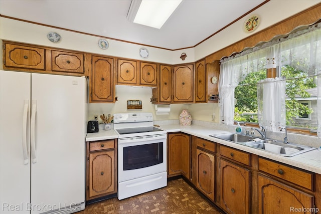 5740 M 66, East Leroy, MI 49051 - kitchen with white appliances, brown cabinetry, light countertops, and crown molding