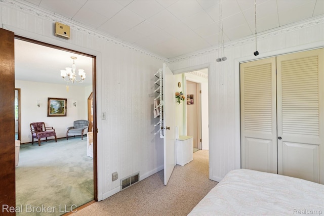 5740 M 66, East Leroy, MI 49051 - bedroom featuring carpet flooring, a chandelier, and a closet