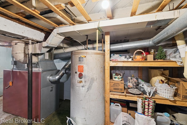 5740 M 66, East Leroy, MI 49051 - utility room featuring gas water heater and heating unit
