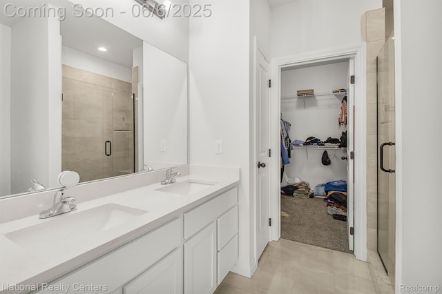11801 Hines Place Dr, Livonia, MI 48150 - full bath with a walk in closet, a shower stall, double vanity, and tile patterned flooring